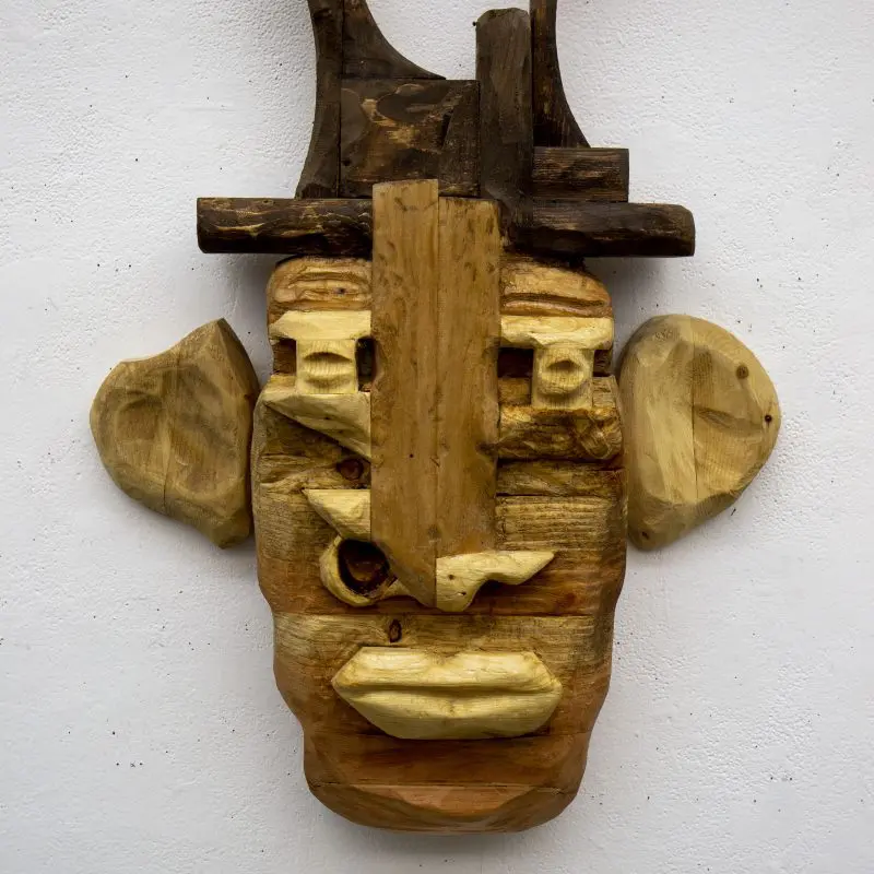 A face made of carved wood