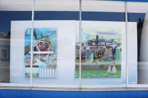 Two paintings in the 301 Frame Gallery