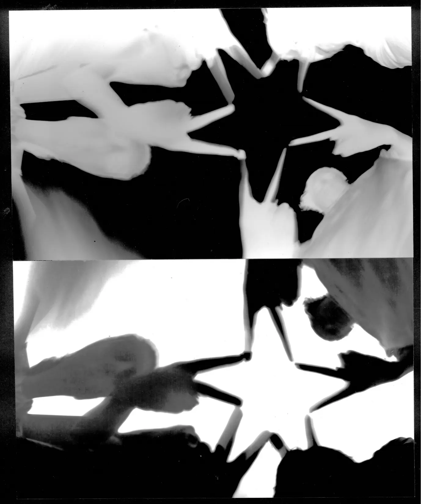 Pinhole camera photo of people making a star with their fingers
