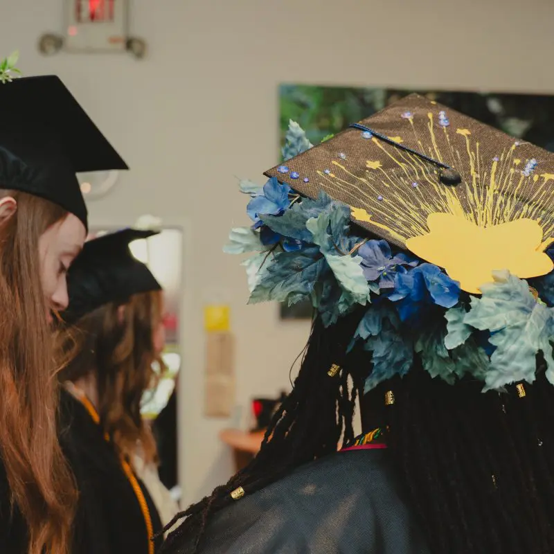 Students with decorated graduation caps