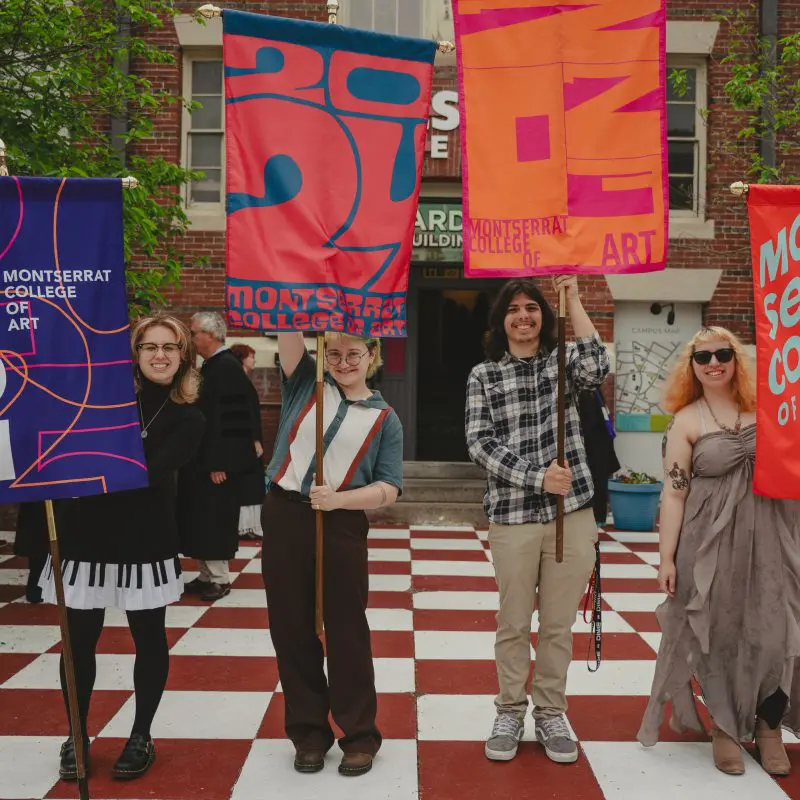 Students holding class banners