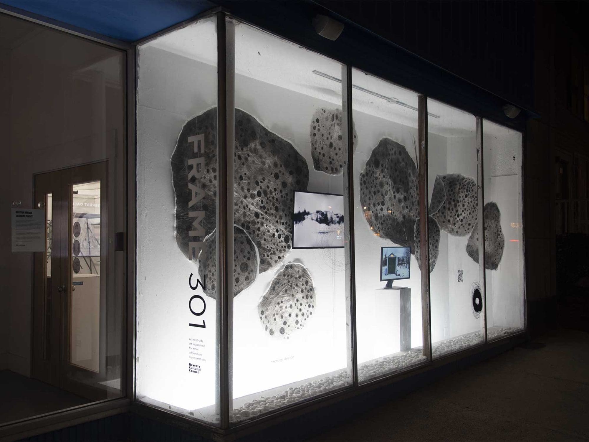 storefront window with art inside